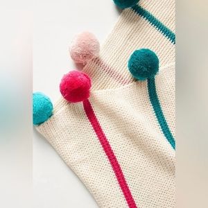 Anthropology baby Pom Pom throw.